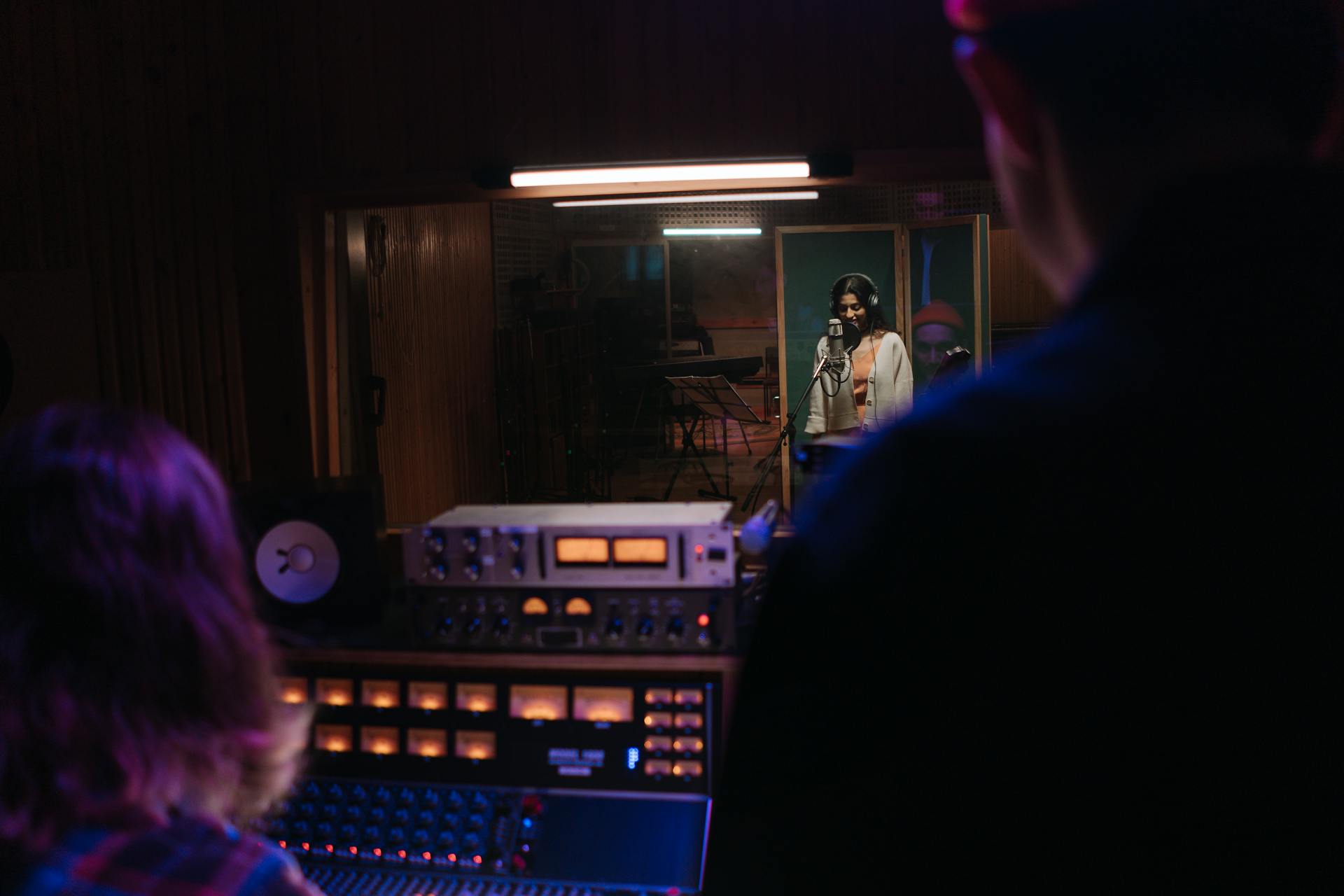 Professional music studio with mixing console, monitors, and equipment - representing the professional audio environment that AudioCollabz serves